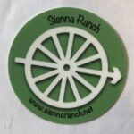A green Sienna Ranch Sticker with the word sima ranch on it.